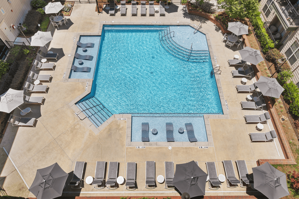 a view of the pool from above at the waldorf astoria hotel pool