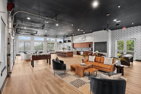 A modern living room with a large sofa and a coffee table.