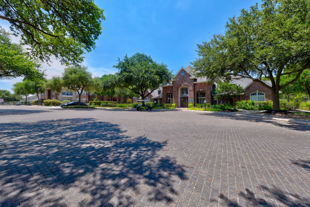 a large parking lot in front leasing office