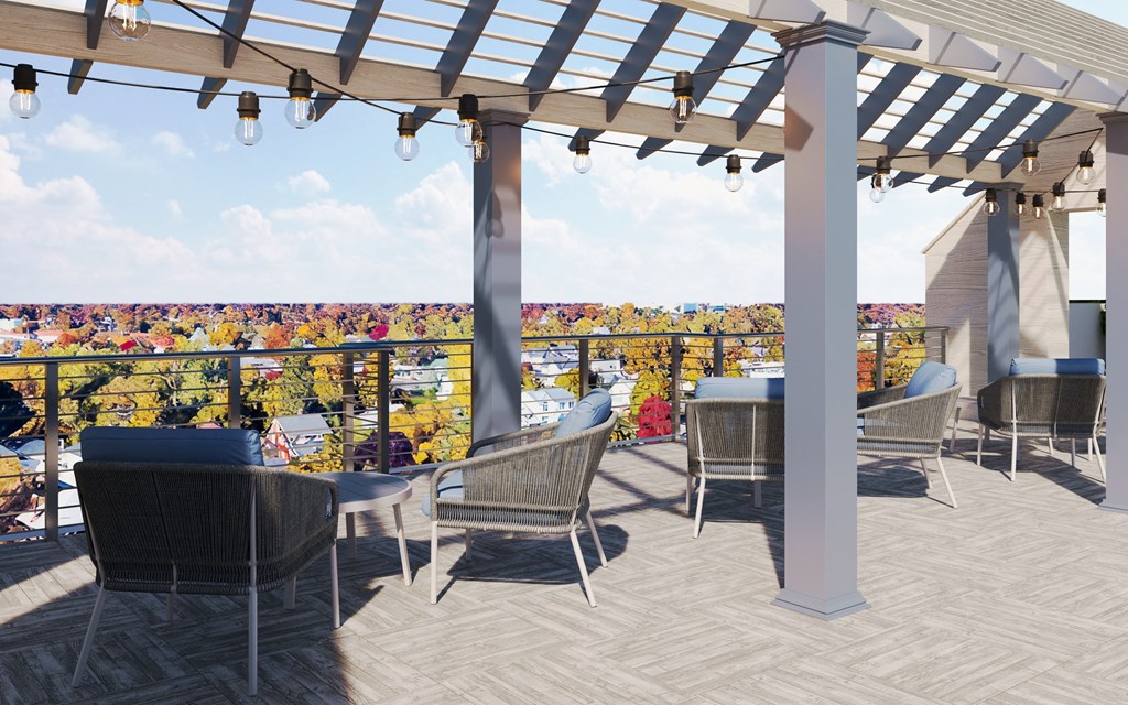 a rendering of a patio with tables and chairs on a roof