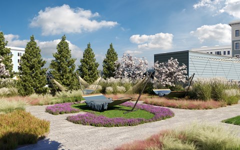 a landscaped garden with boats and trees and buildings