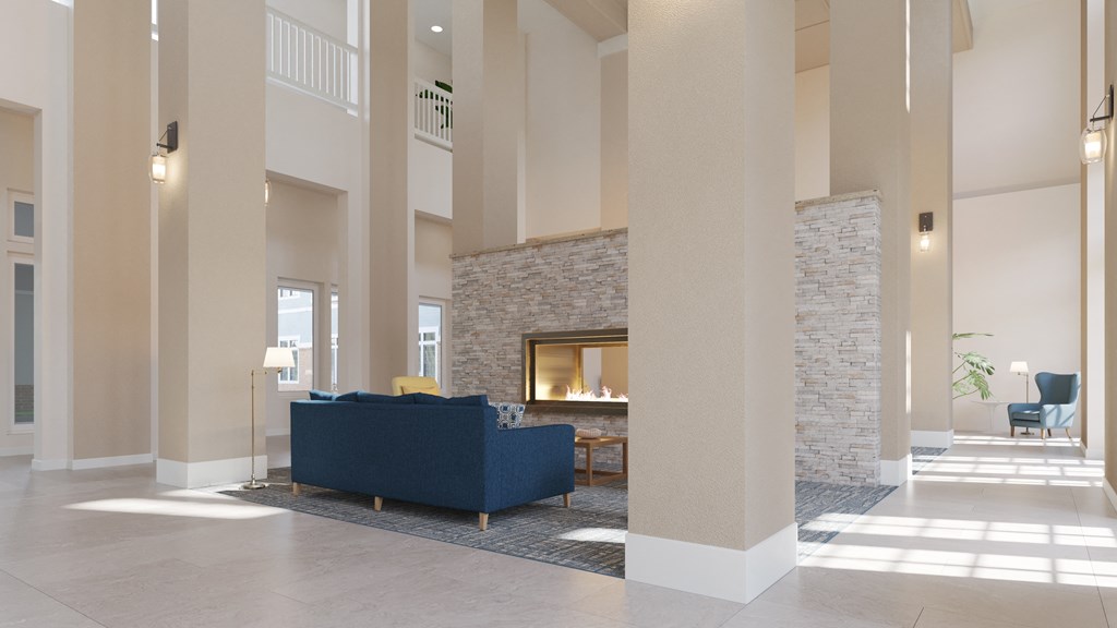 a living room with a fireplace and a blue couch