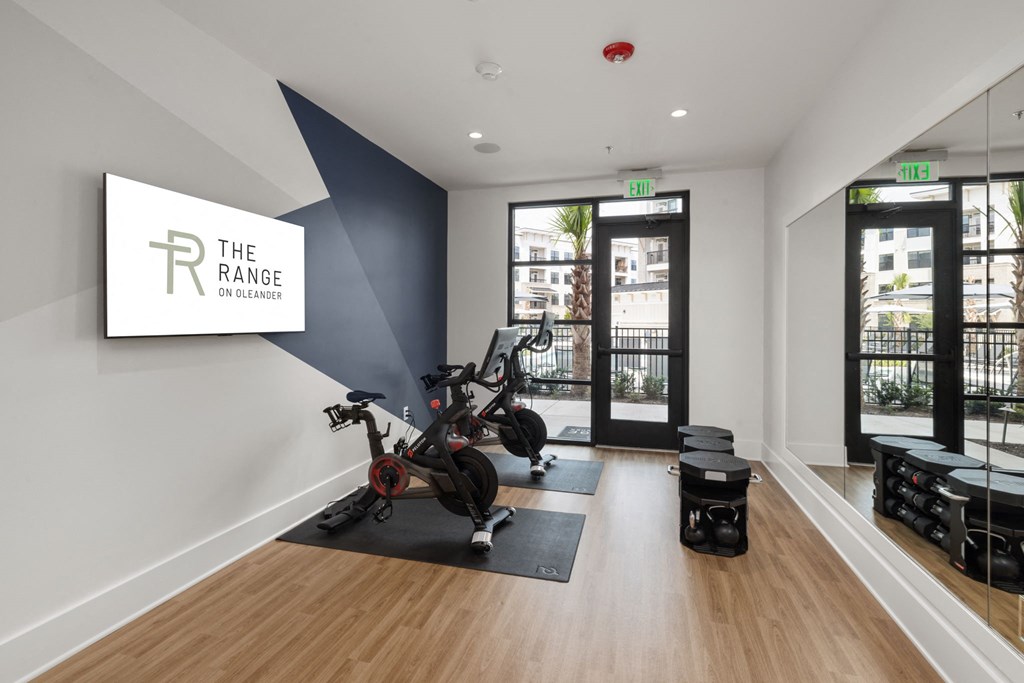 the gym at the range on oleander apartments