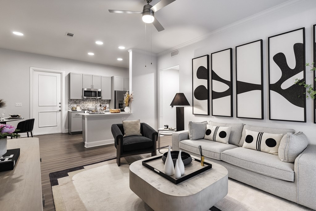A Living Room With Paintings at 3500 Westlake Apartments, Austin