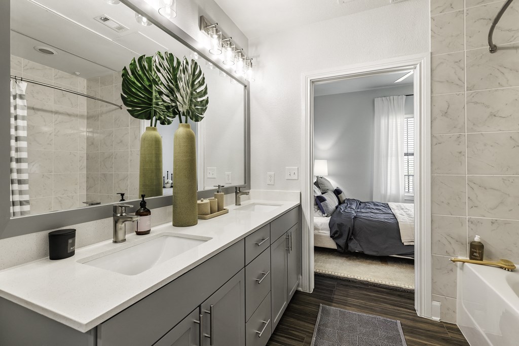 A Bathroom With Gray Cabinets at 3500 Westlake Apartments, Austin