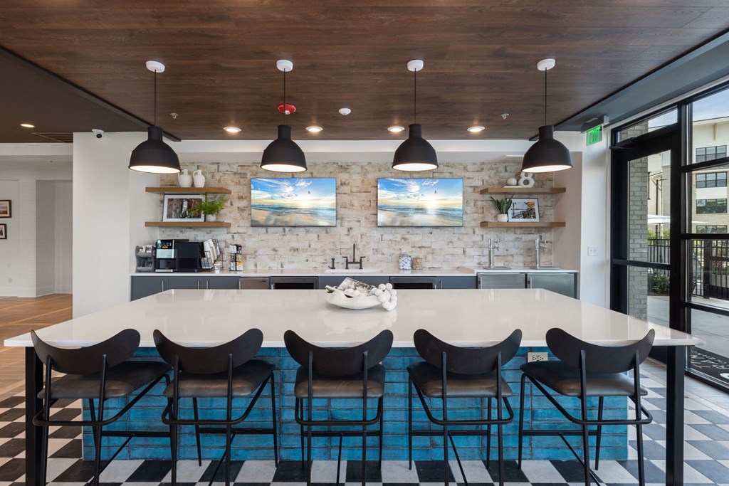 a large kitchen with a large table and chairs