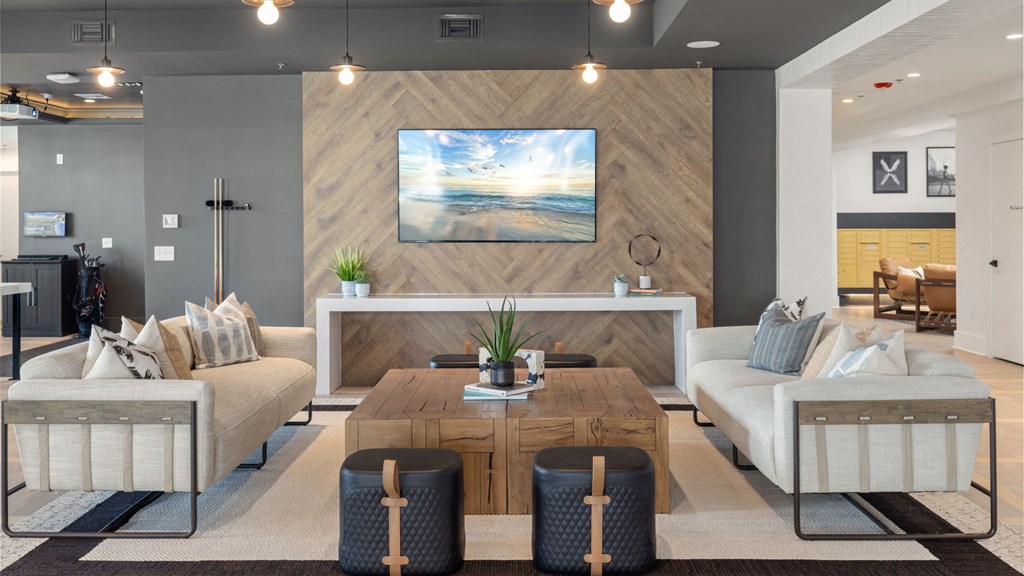 a living room with couches and a coffee table