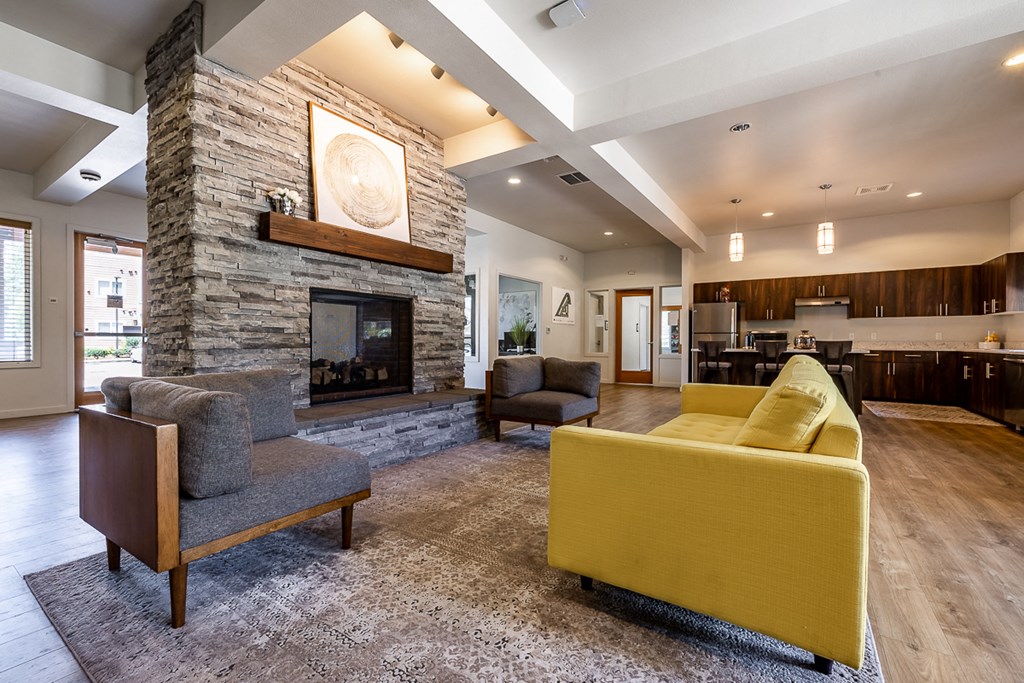 clubhouse with seating and fireplace