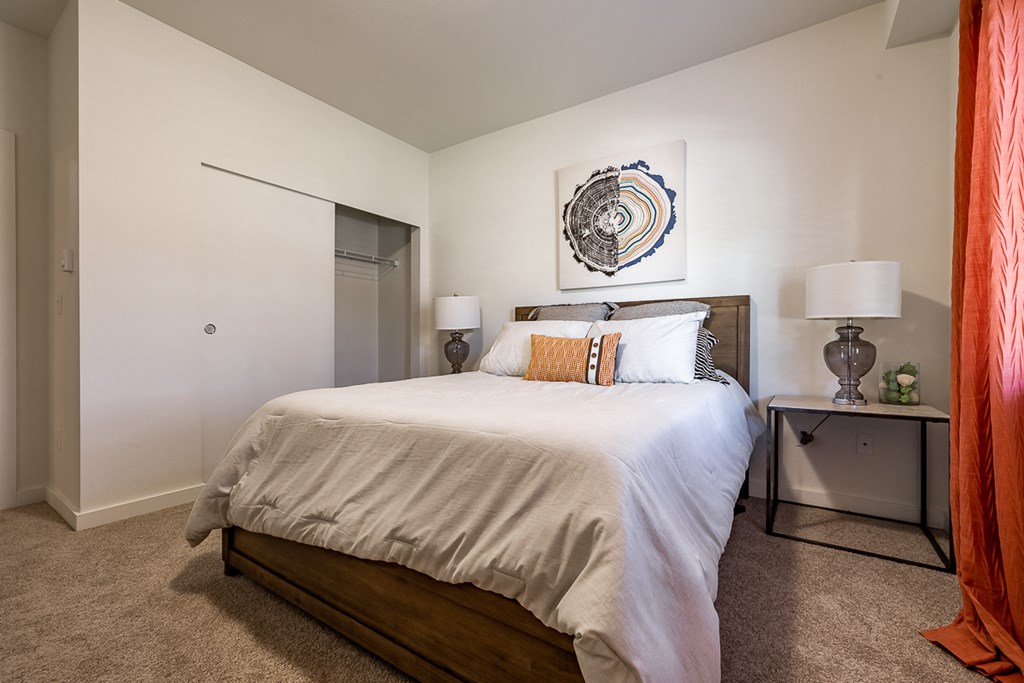 bedroom with large bed and closet