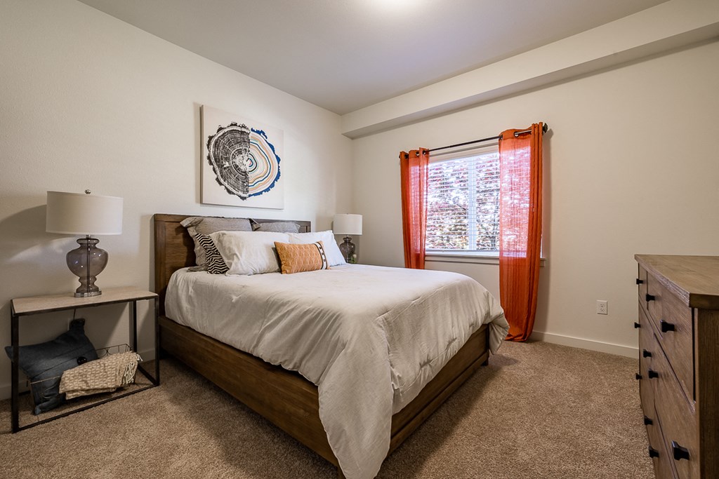 bedroom with large bed and window