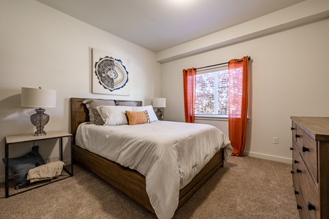 bedroom with large bed and window