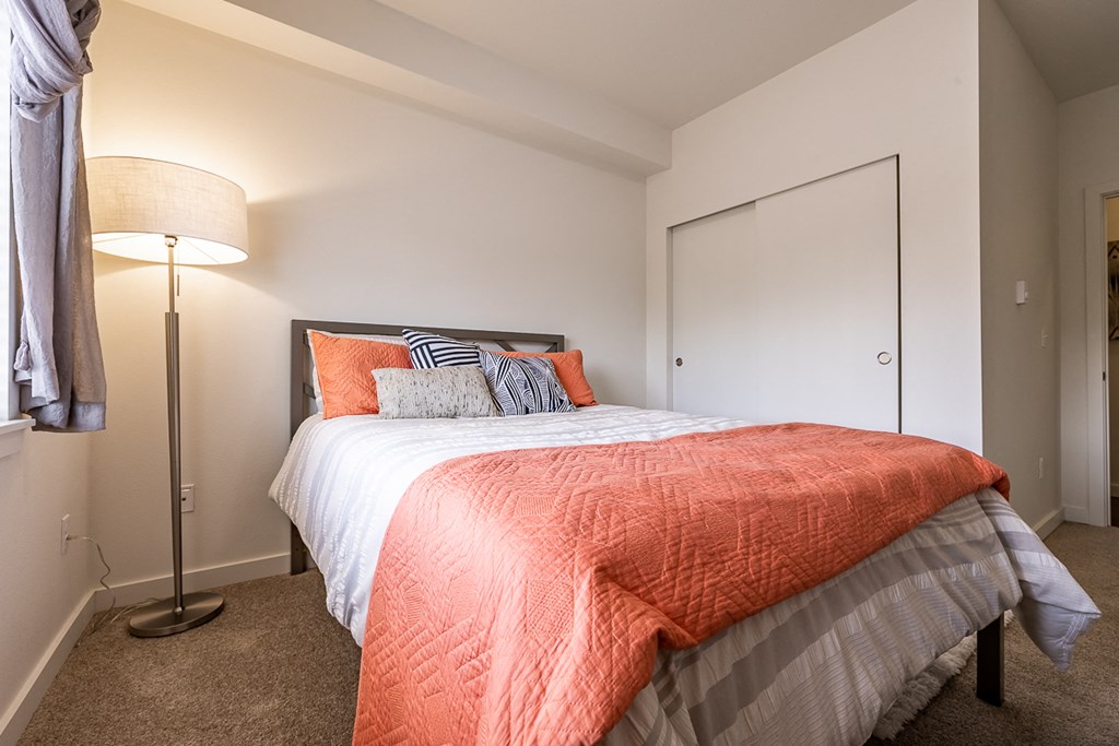 bedroom with large bed and closet