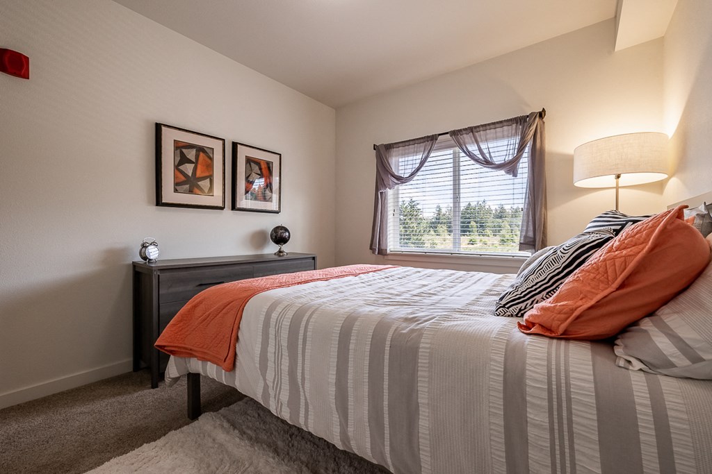 bedroom with large bed and window