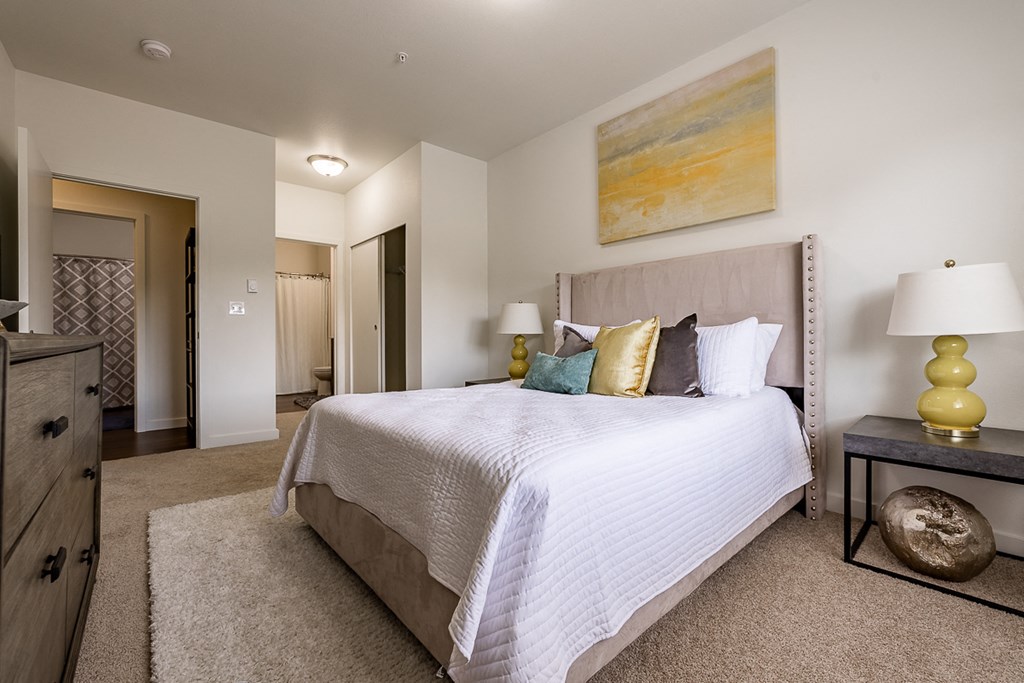 bedroom with large bed and closet