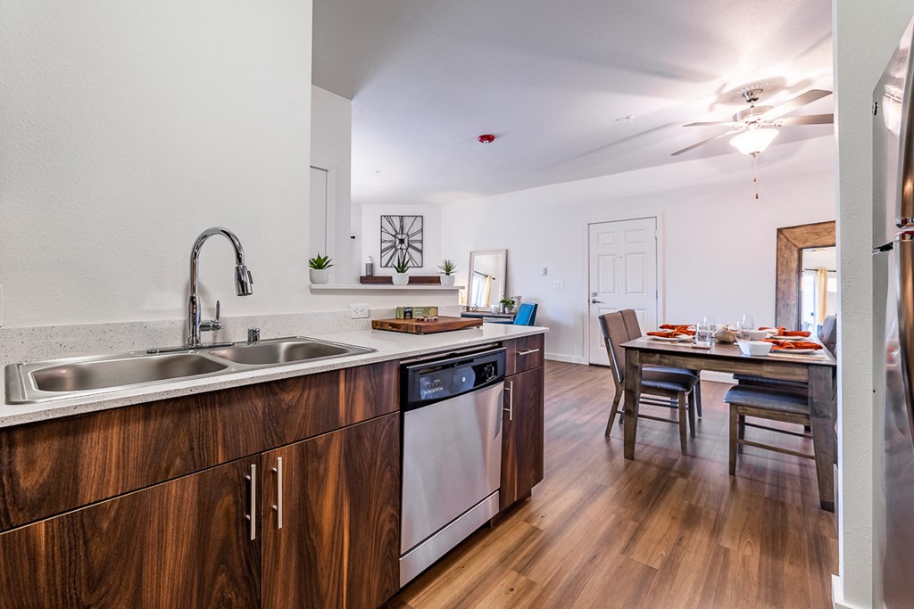 Kitchen showing appliances and dining table