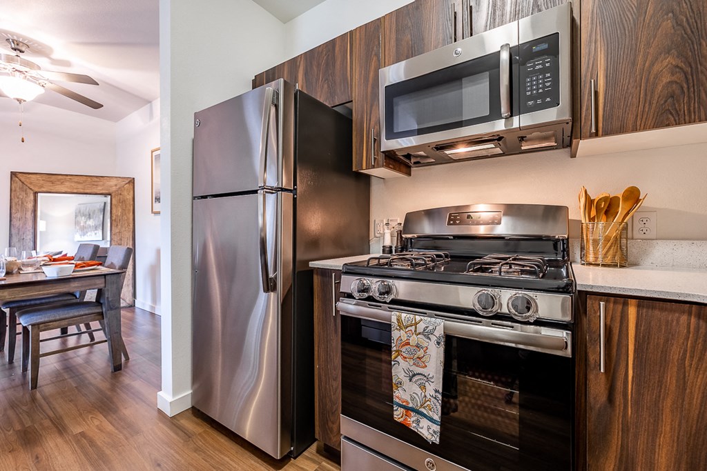 Kitchen showing appliances and dining table