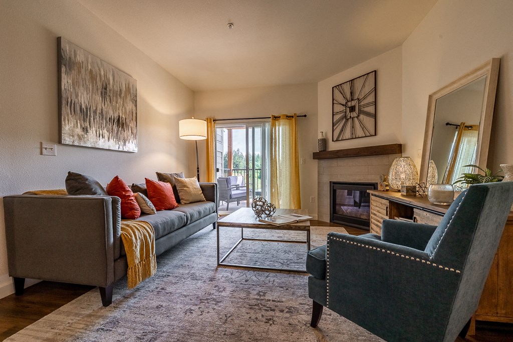 Living room with fireplace and sliding door to patio