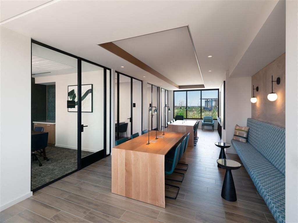 a rendering of a living room and dining room in a modern house