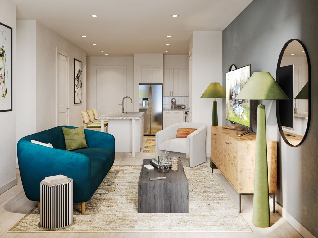 a living room with a blue couch and a table