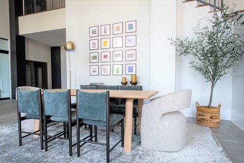 Clubroom room with a wooden table and blue chairs