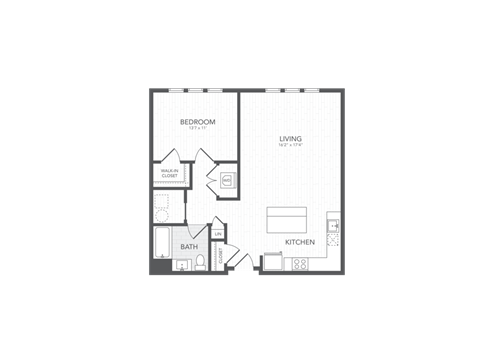A floor plan of a house with a bedroom, living room, kitchen, and bathroom.