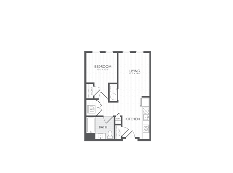 A floor plan of a small apartment with a bedroom, living room, kitchen, and bathroom.