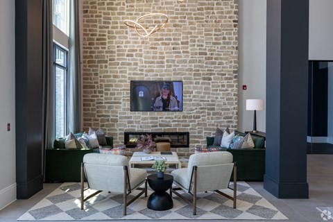 Clubroom seating with fireplace and tv