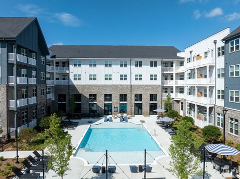 Pool with sundeck with inner courtyard view