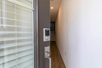 a view of the hallway from the front door