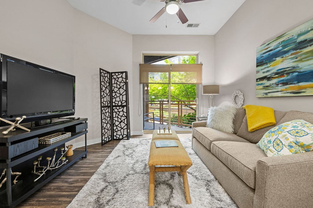 a living room with a couch and a television