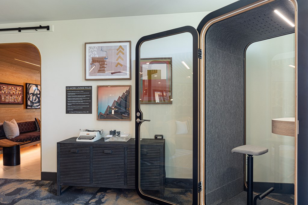 a room filled with furniture and a large window