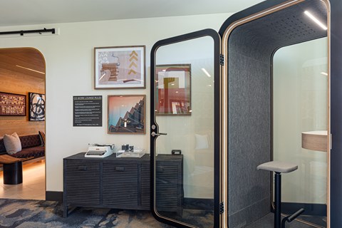 a room filled with furniture and a large window