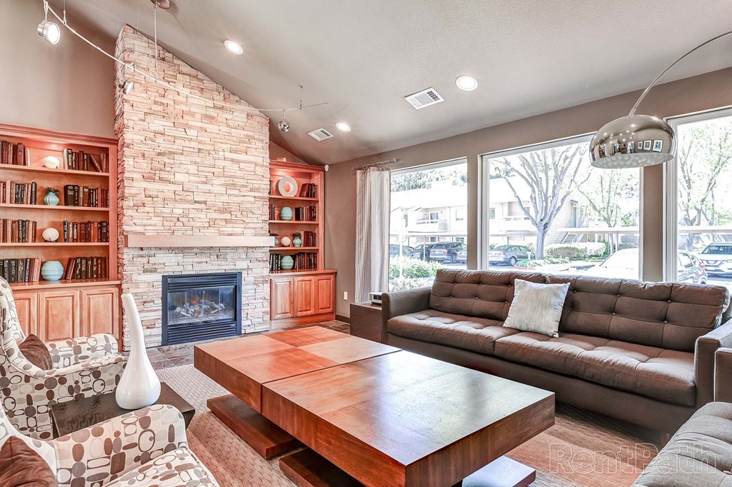 Resident lounge with fireplace  at The Seasons Apartments, California