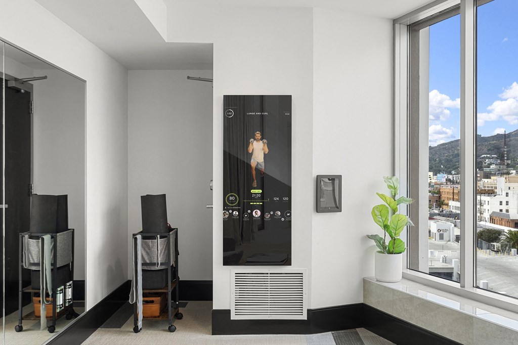 a picture of a man on a projector screen in a living room