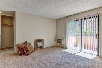 Living Room With Expansive Window Living Room With Expansive Window at Mission Sierra Apartments, California - Photo Gallery 4