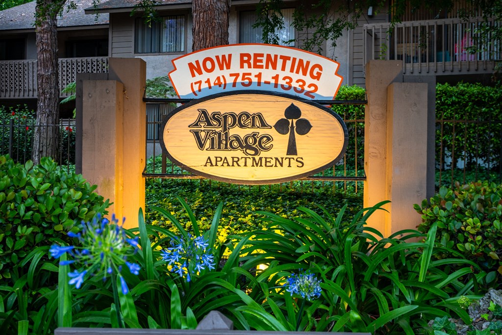 a sign for a now renting