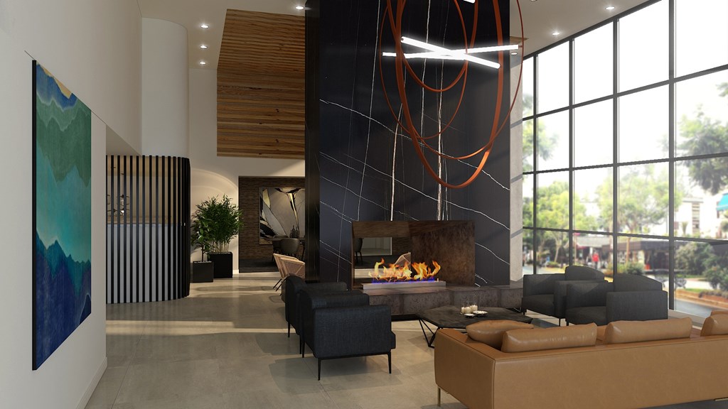 A modern living room with a fireplace and a large painting on the wall.