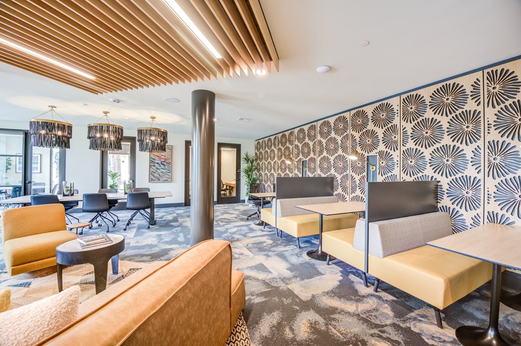 a communal area with couches and tables