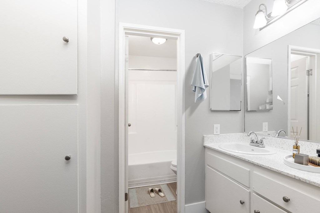 a building with a sign that reads caribbean cove apartment homes