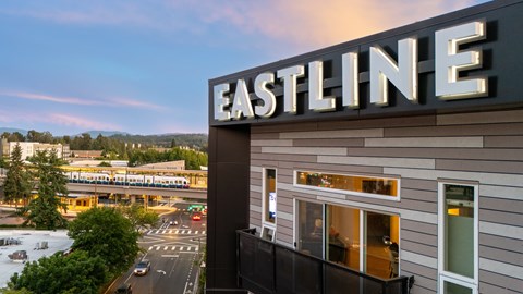 A building with the word "EASTLINE" on top of it.