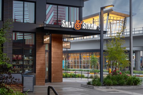 Salt and Straw restaurant entrance with a black awning.