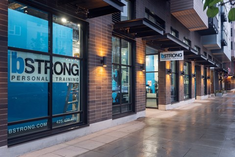 The exterior of a personal training facility called BSTRONG.
