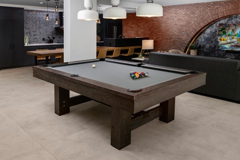a billiards table in a living room