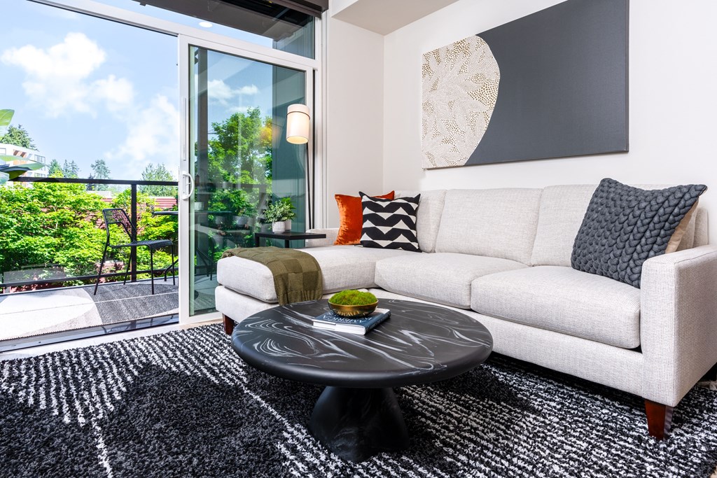 a living room with a couch and a coffee table