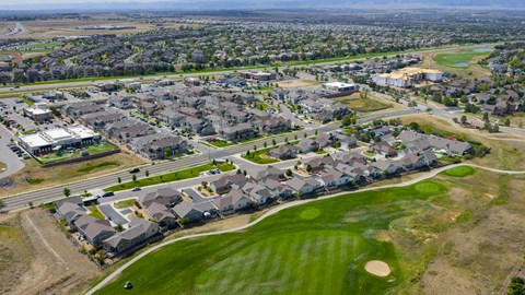 A golf course is located in the middle of a residential neighborhood.