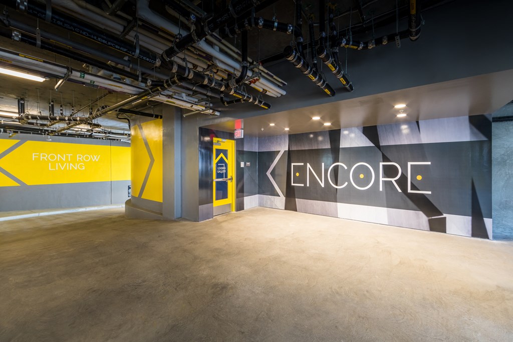 a large room with a large wall with large letters on it