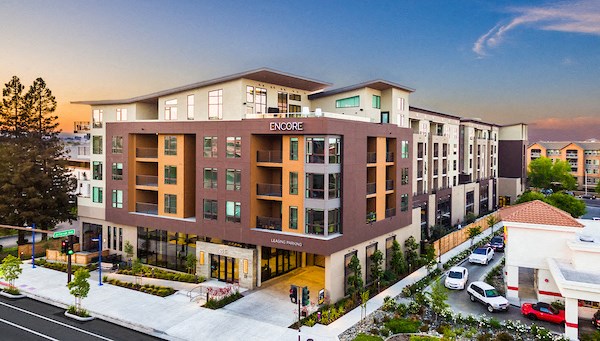 a rendering of a building with a street in front of it