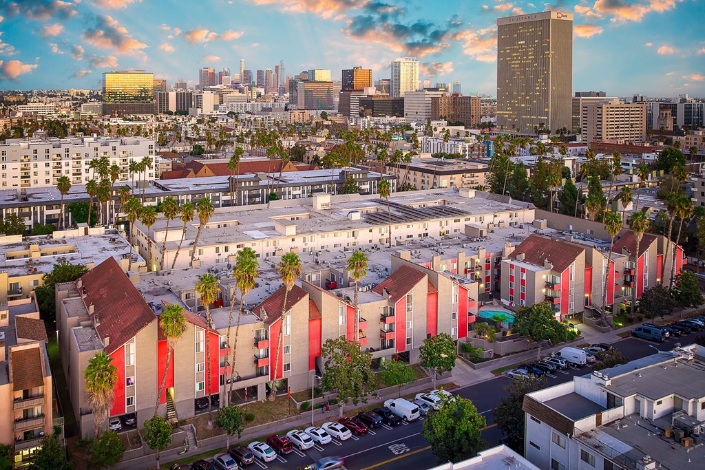an aerial view of the city with buildings and a city skyline