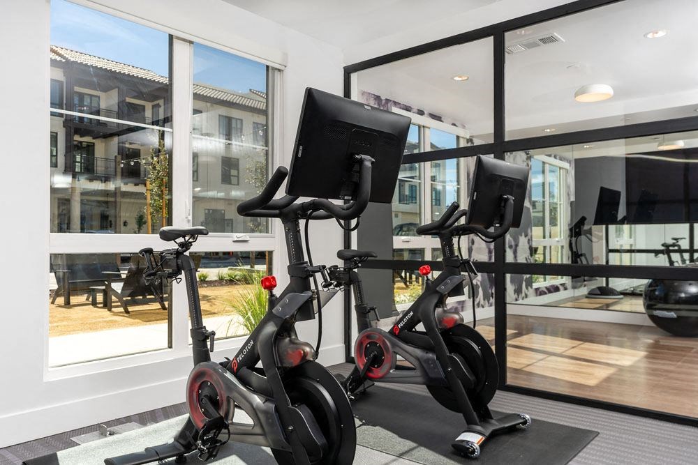 fitness center with cardio equipment