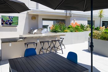 Outdoor BBQ lounge at Metwest apartments. Outdoor BBQ lounge at Metwest apartments. - Photo Gallery 2